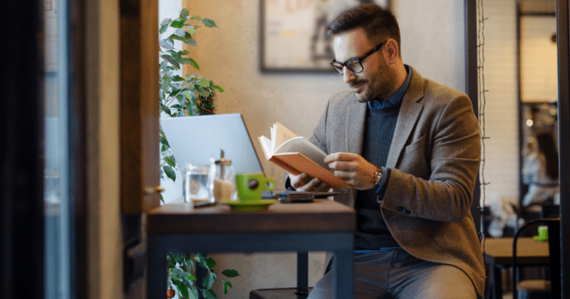 Professional man reading in order to improve mental performance